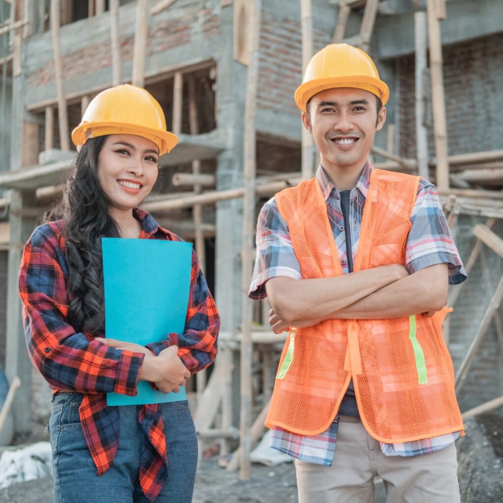 Construction team reviewing millimeter-accurate as-built CAD drawings generated from LiDAR scanning