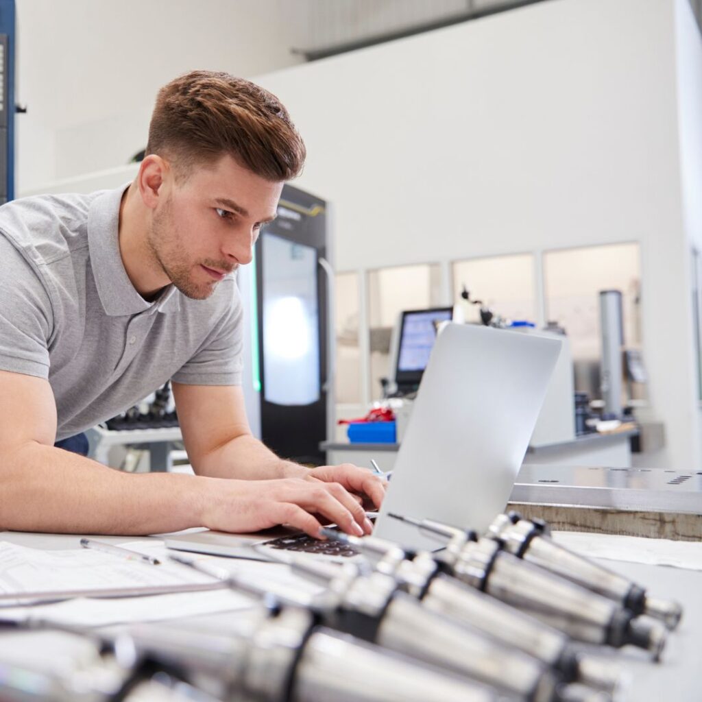 man using CAD software