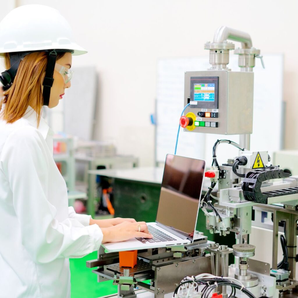 woman using CAD software on laptop