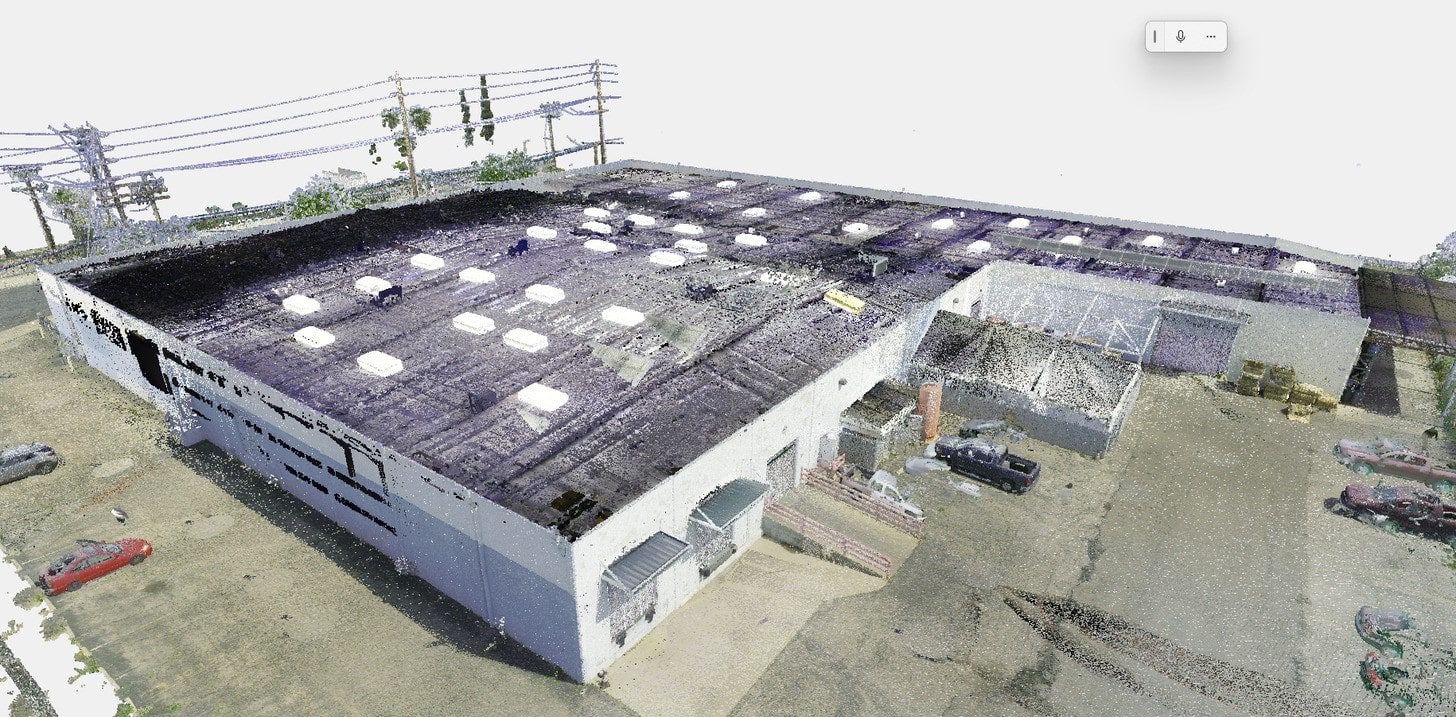 Point cloud of a warehouse created from 3D laser scanning for accurate as-built documentation.