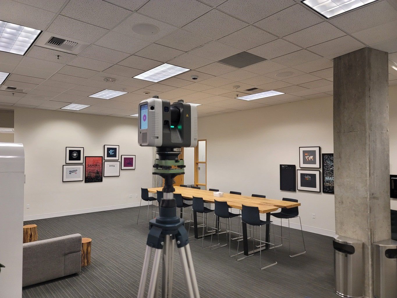3D laser scanner positioned in an office capturing detailed as-built data for BIM modeling