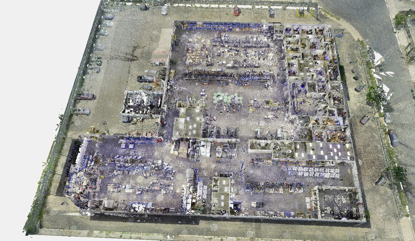 Point cloud section of a warehouse in Salt Lake City created from 3D laser scanning for as-built documentation.