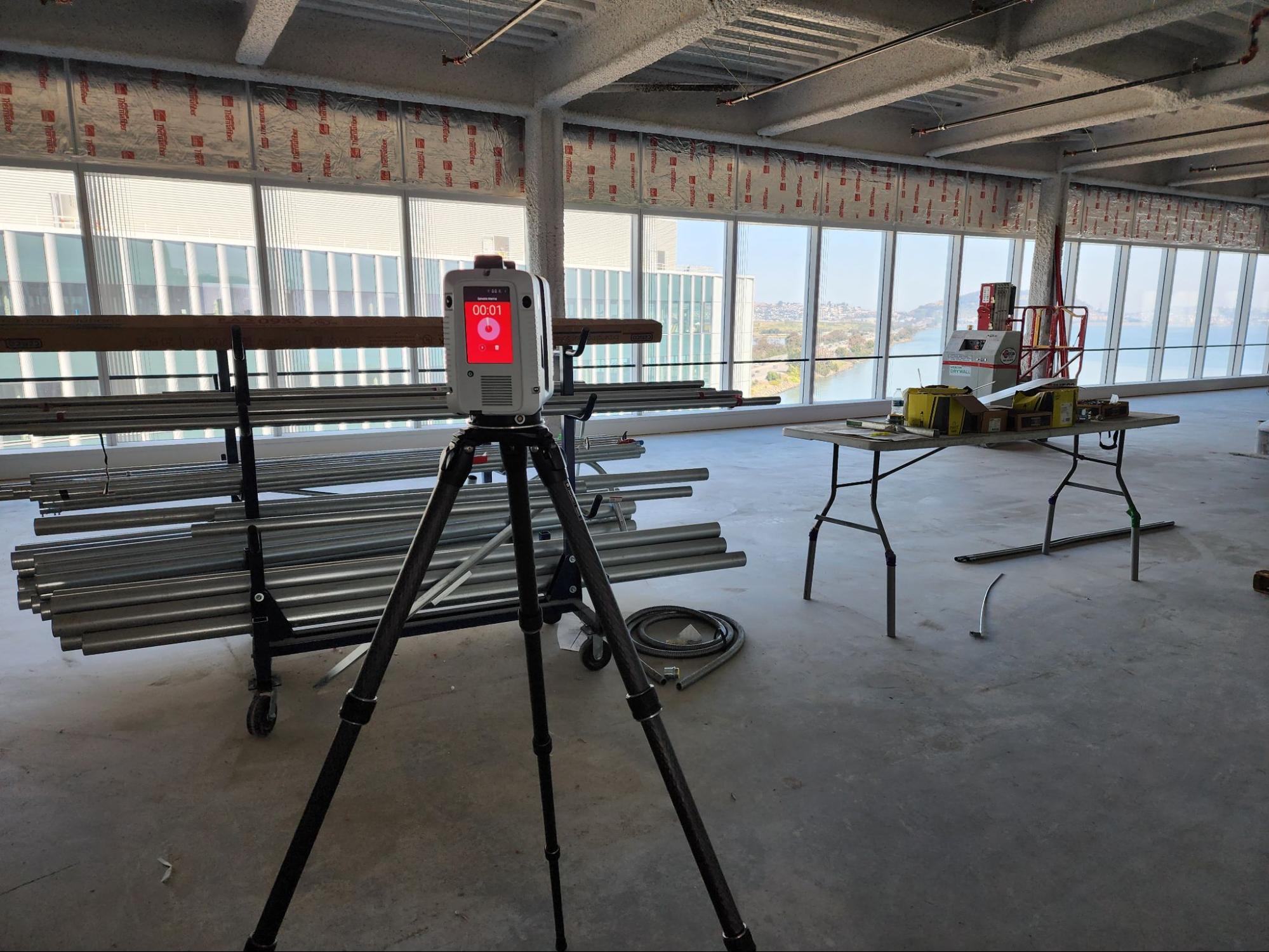LiDAR 3D laser scanner capturing existing conditions on commercial construction site for as-built drawings documentation