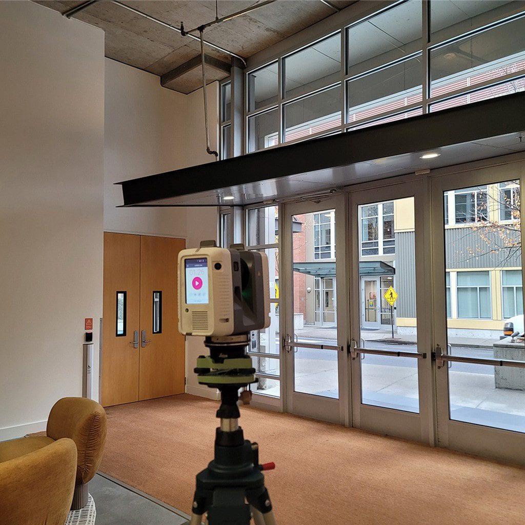 3D laser scanning the main entry of a school in Las Vegas for accurate as-built documentation.