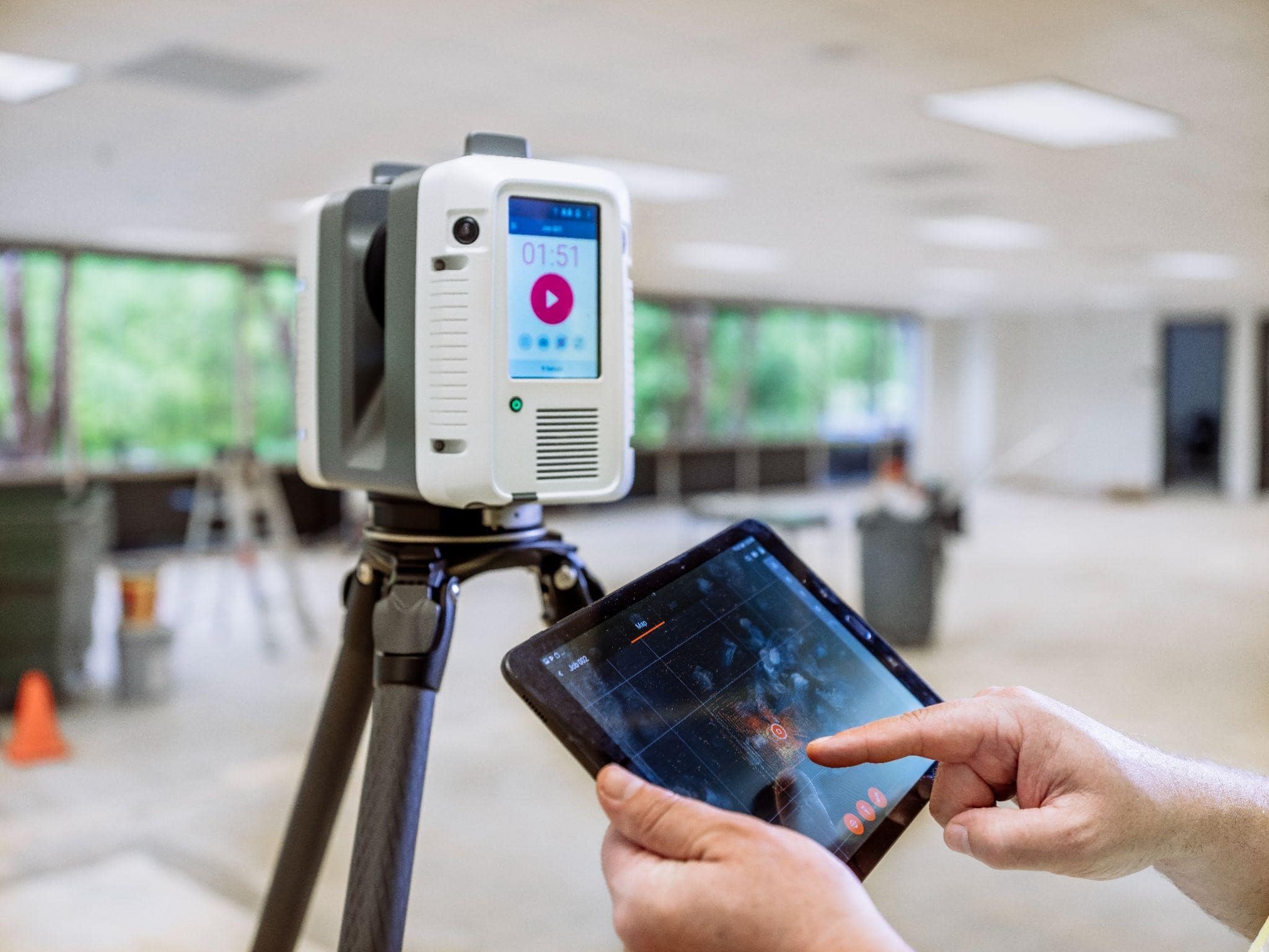 Leica RTC360 3D laser scanner capturing point cloud data for professional as-built drawing services